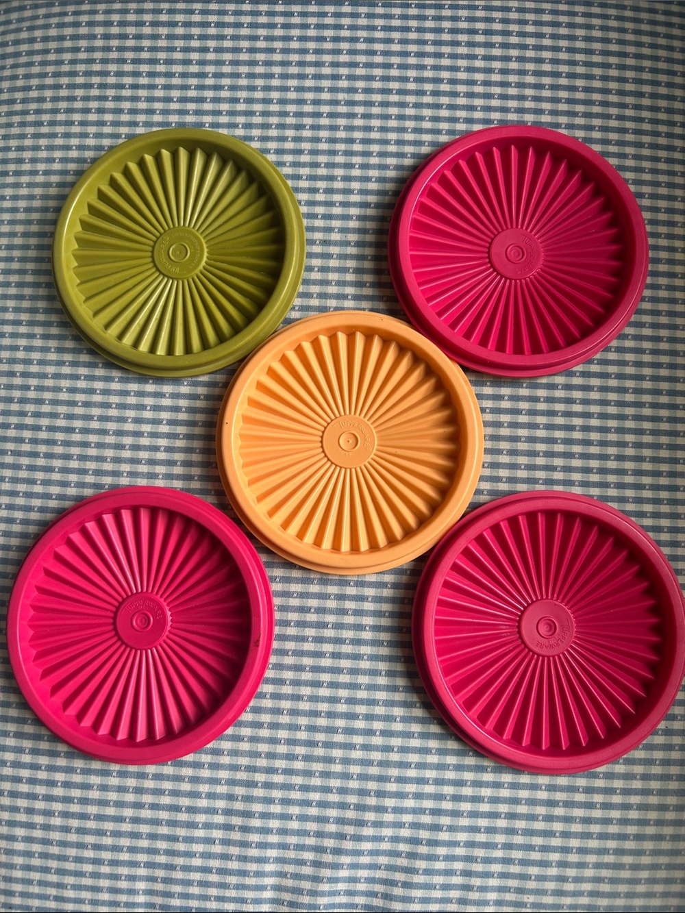 Five Tupperware replacement lids